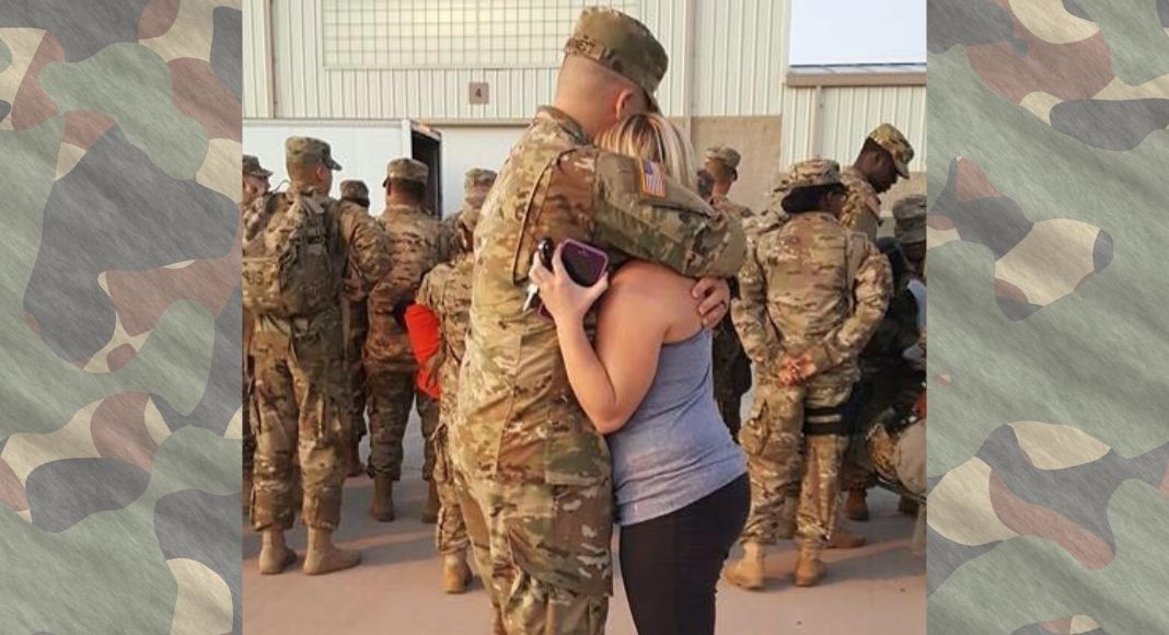 soldier hugging spouse before deployment