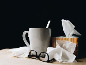 tissues and glasses with white mug