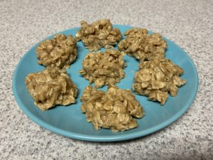 Peanut butter no bake cookies on blue plate.