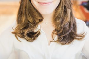 woman smiling with hair cut