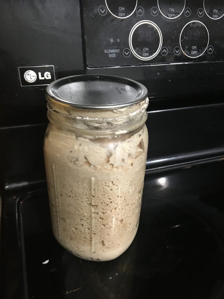 glass jar with sourdough starter