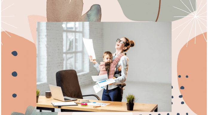 busy mom holding baby and working