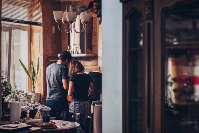 couple cooking in their kitchen