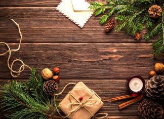 holiday tidings and presents on wood table