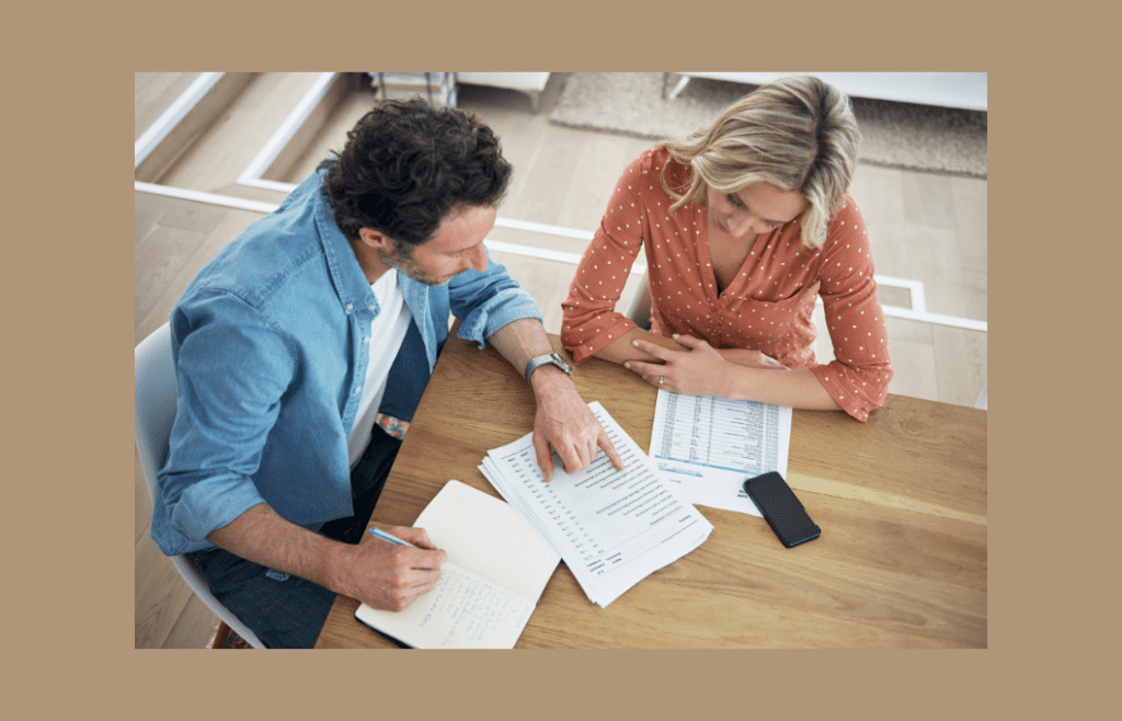 married couple going over financial documents