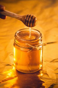 honey in jar with spoon