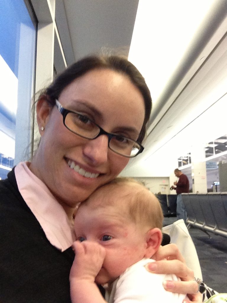 Mom and baby waiting in airport