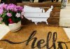 doormat with "hello" and flower pot with US map