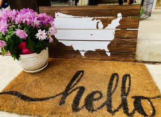 doormat with "hello" and flower pot with US map