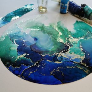 A stunning image of green and blue alcohol paint with gold throughout. Any original art print from Grace Selous Bull Art is a perfect gift for moms!