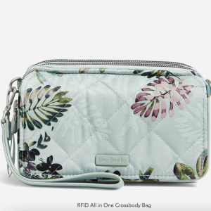 A stunning cross body wallet in pale blue with pastel leaves by Vera Bradley. This is a great gift for mom!