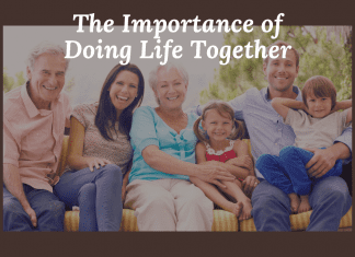 Multigenerational family portrait in grayscale with "The Important of Doing Life Together" in text