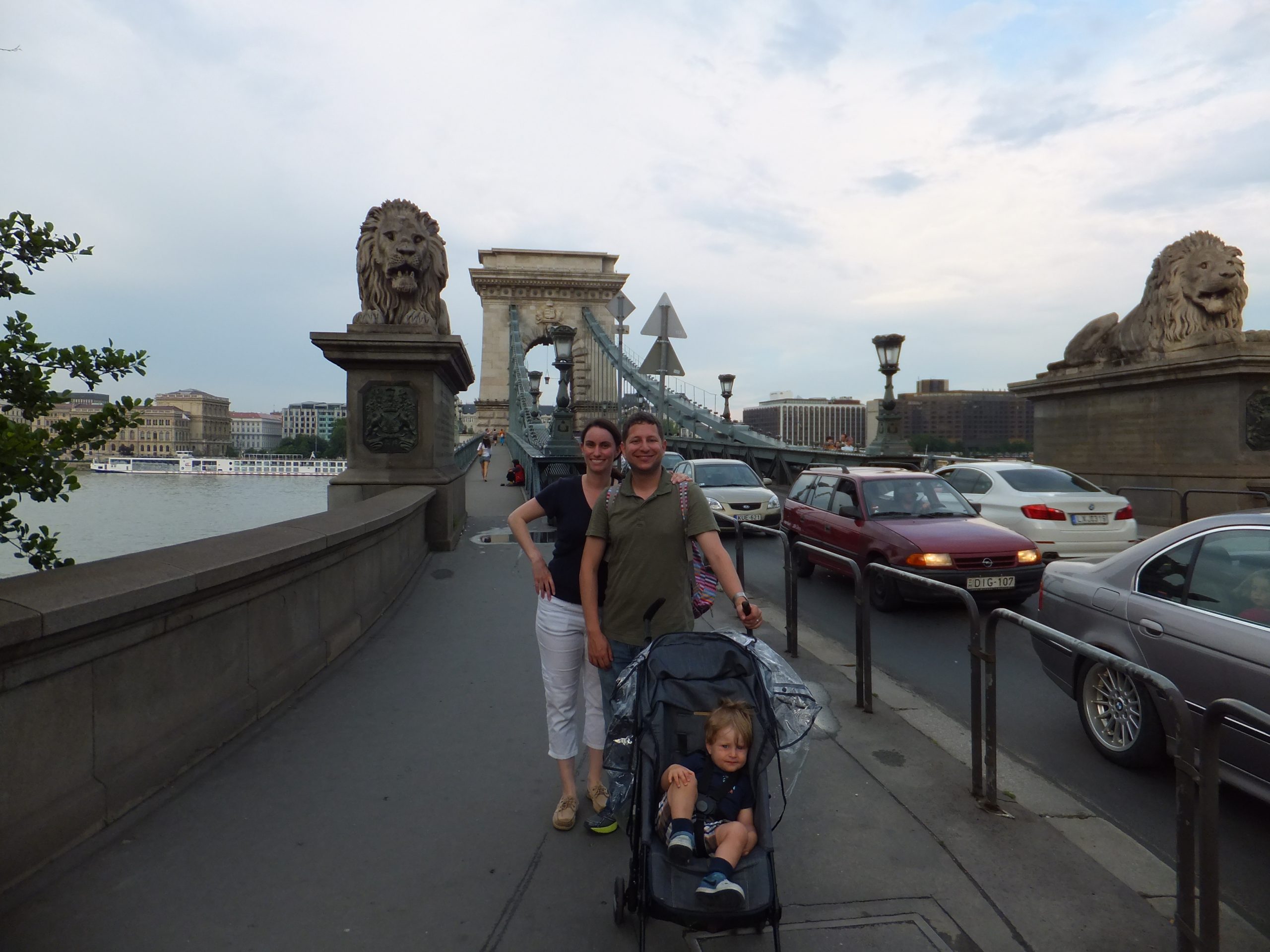 Family standing on Chain Bridge in Budapest, 2014