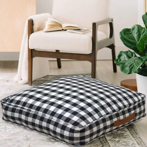 Better Homes & Gardens gingham floor pillow in a neutral room