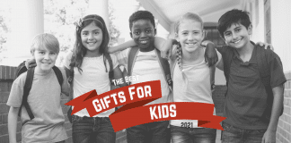 group of children with "Gifts for Kids 2021" on red holiday ribbon