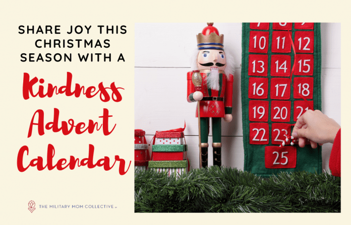 advent calendar with a nutcracker and pine garland and 