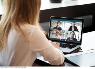 Woman working remote and in a virtual meeting