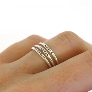 stackable dainty silver rings with names engraved on them