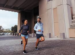 two people running outdoors
