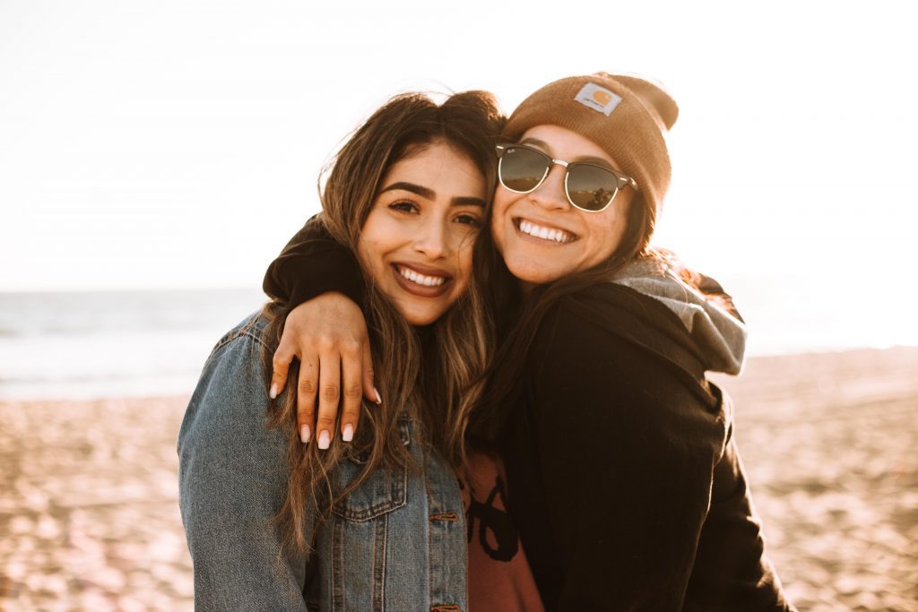 two female friend standing and embracing