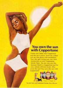 Coppertone sunscreen ad with woman in white swimsuit