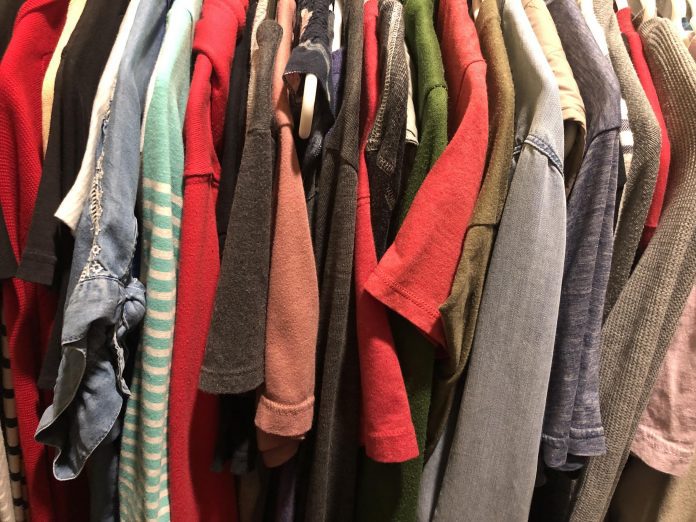 closet view of shirts on hangers