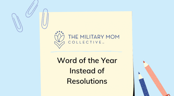 a blue background with a sheet of paper with the MMC logo and "Word of the Year Instead of Resolutions" in text, paper clips and blue and red pens on the sides