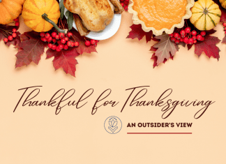 Thanksgiving meal with pumpkin and leaf accents with "Thankful for Thanksgiving: An Outsider's View" in text with MMC logo