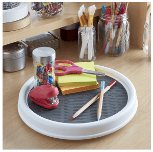 lazy susan with art and office supplies