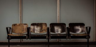 beaten up, leather chairs in a waiting room