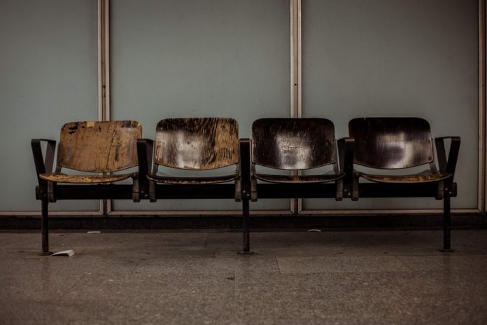 beaten up, leather chairs in a waiting room