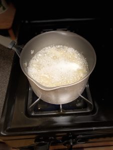 pasta boiling in a pot on the stove