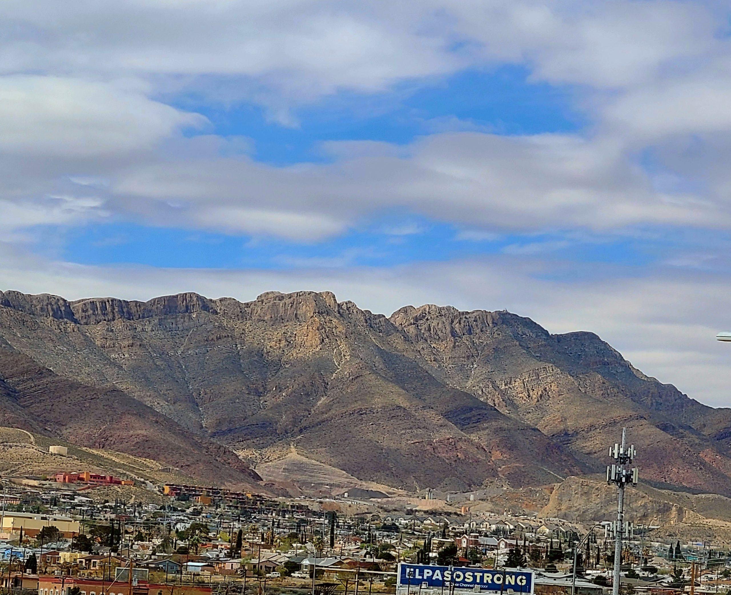 Image shows the mountainous landscape within the El Paso desert, as well as part of the city. 